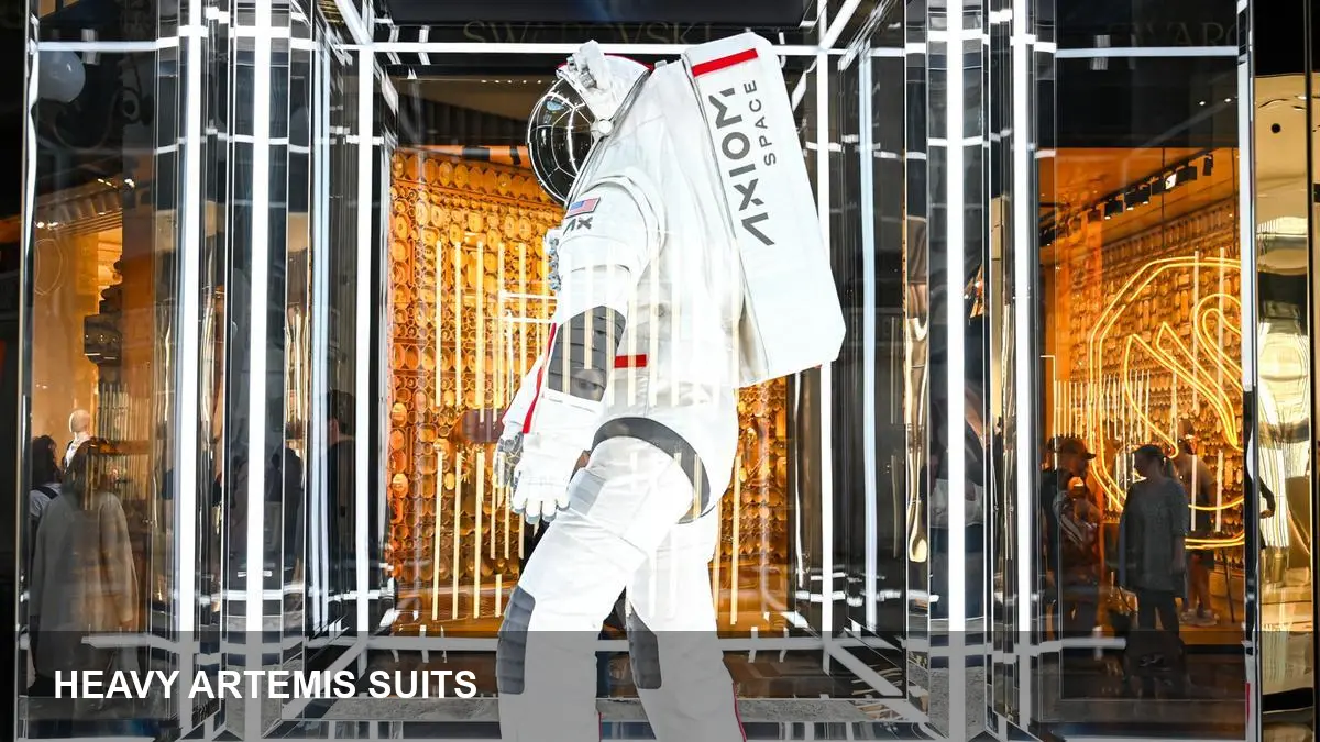 Ex-astronauts flag Artemis II spacesuit heft
